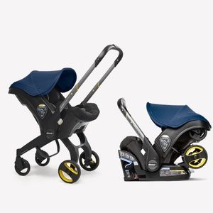 Doona USED. Good condition. Base included. Rain cover included for free 45$)